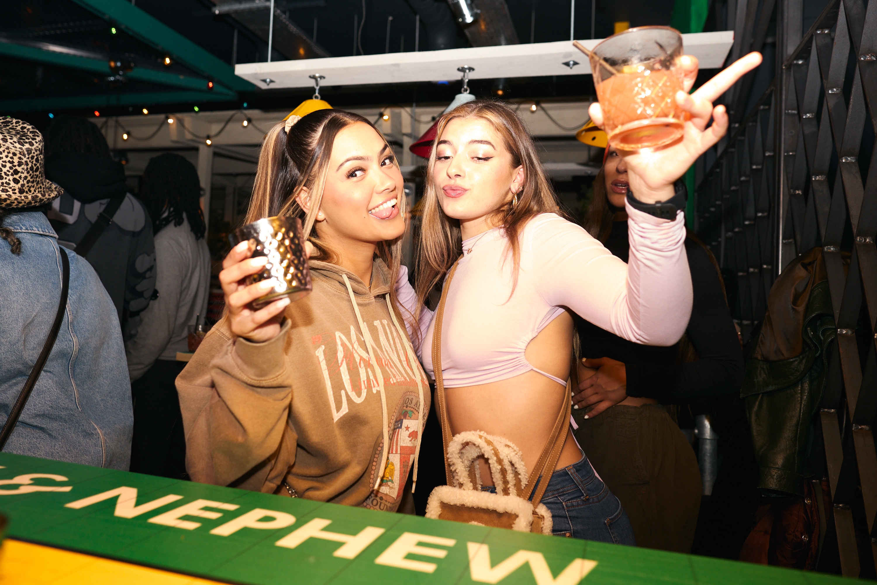 Girls enjoying cocktails