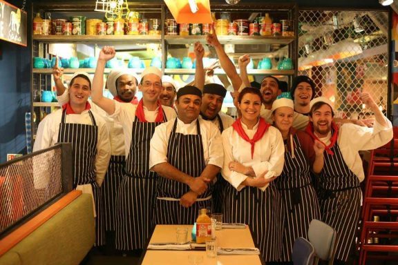 Smiling kitchen team